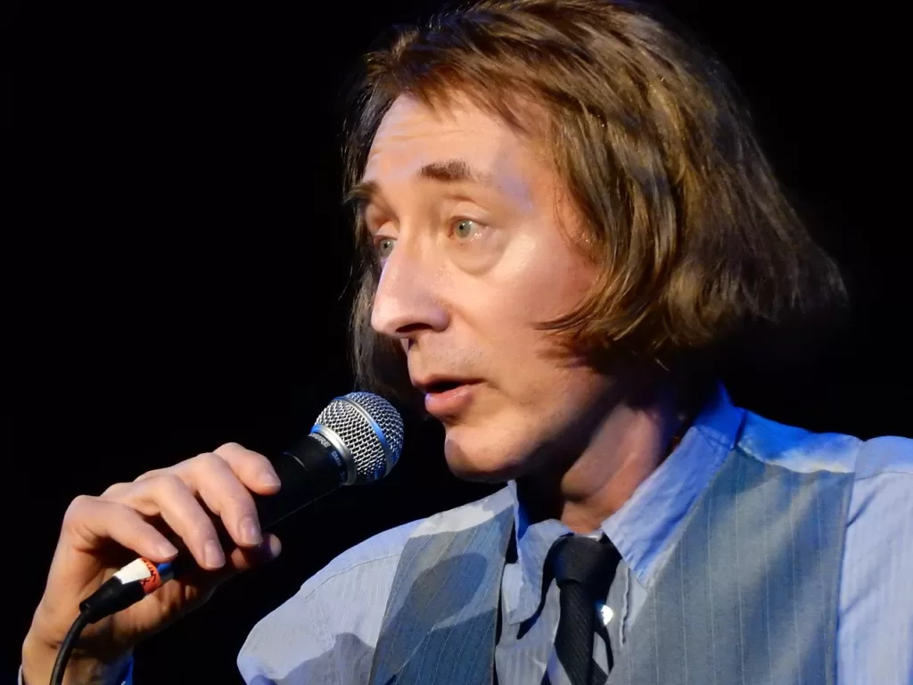 Emo Philips (born Philip Soltanec, February 7, 1956) is an American actor, stand-up comedian, writer and producer. His stand-up comedy persona makes use of paraprosdokians spoken in a wandering falsetto tone of voice. The confused, childlike delivery of his material produces the intended comic timing in a manner invoking the "wisdom of children" or the idiot savant.
